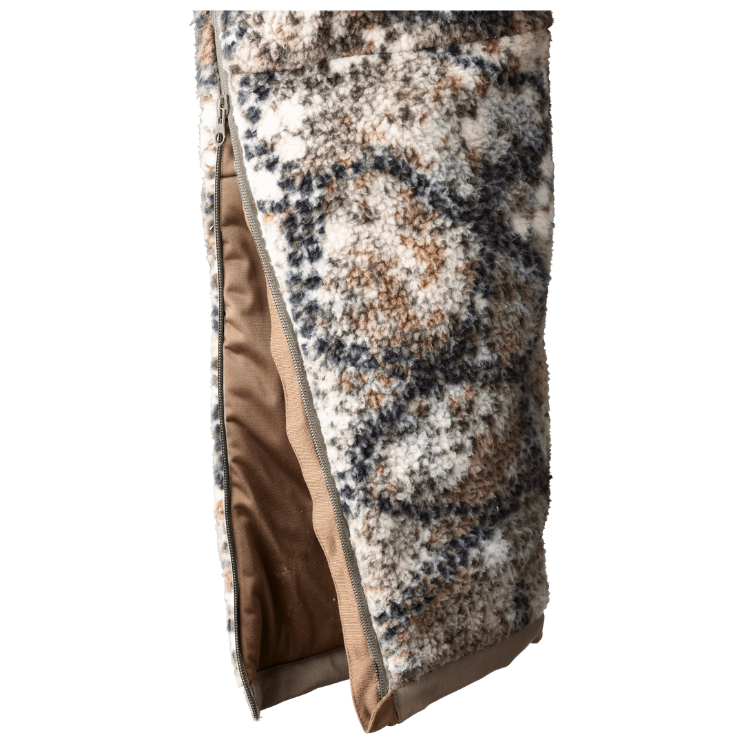 Badlands fleece-lined, zippered pouch in camo pattern, used for gear protection; features the Badlands skull logo.