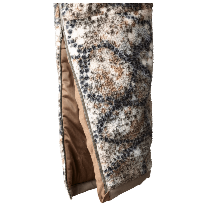 Badlands fleece-lined, zippered pouch in camo pattern, used for gear protection; features the Badlands skull logo.