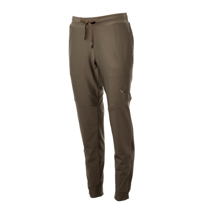 Brown Badlands jogger pants with drawstring waist and skull logo on left thigh. Accessible, comfortable outdoor wear.
