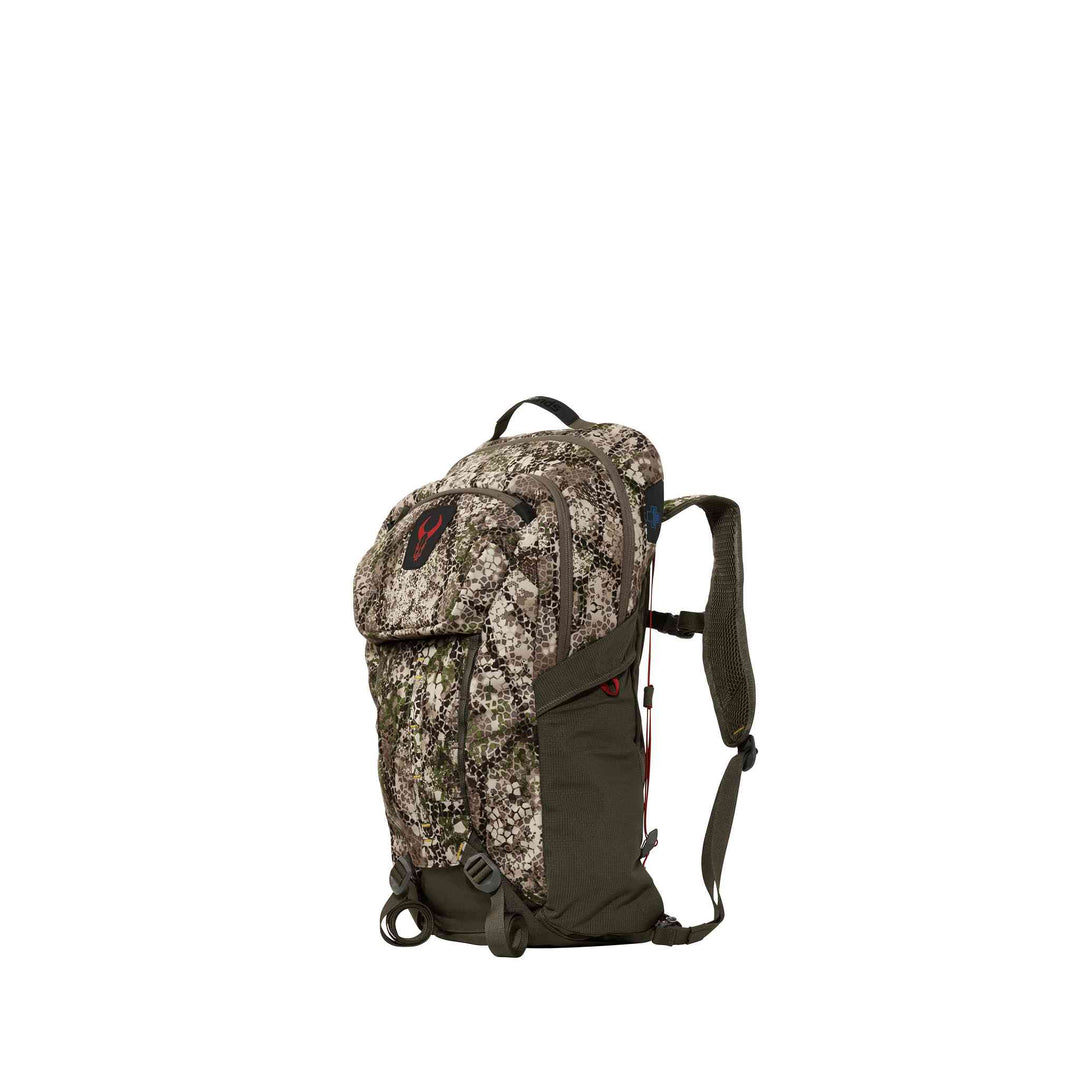 Camo Badlands backpack with signature skull logo, padded straps, and multiple compartments, angled on a white background.