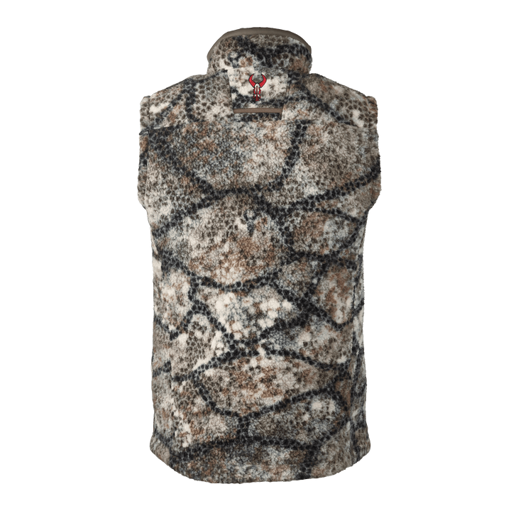 Sleeveless camo vest with Badlands skull logo on collar; earth-tone pattern, fleece texture, high neck.